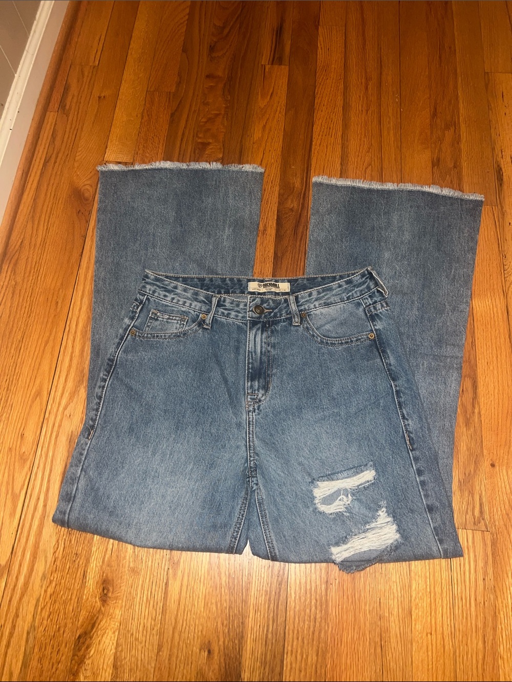 High-Rise Flare Women's Jeans in Medium Blue with Distressed Detail